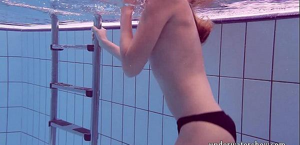  Lucy takes off bikini in the pool